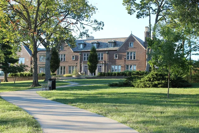 bloch school of management, building, school, college, university, lawn, grounds, nature, landmark, trees, summer, spring, path, lane, kansas city, missouri, green city, green school, green building, green management, green path. Management degree schools: Florida and Arizona oversight